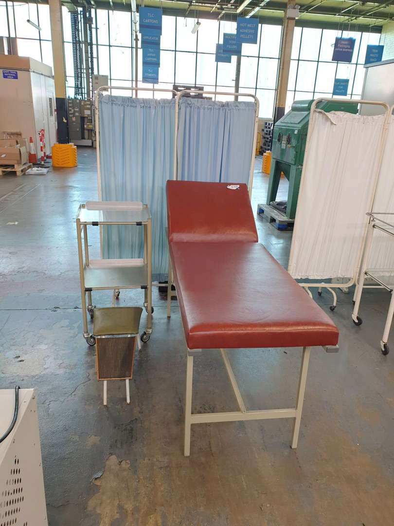 Adjustable first aid bed, privacy screens, foot st...