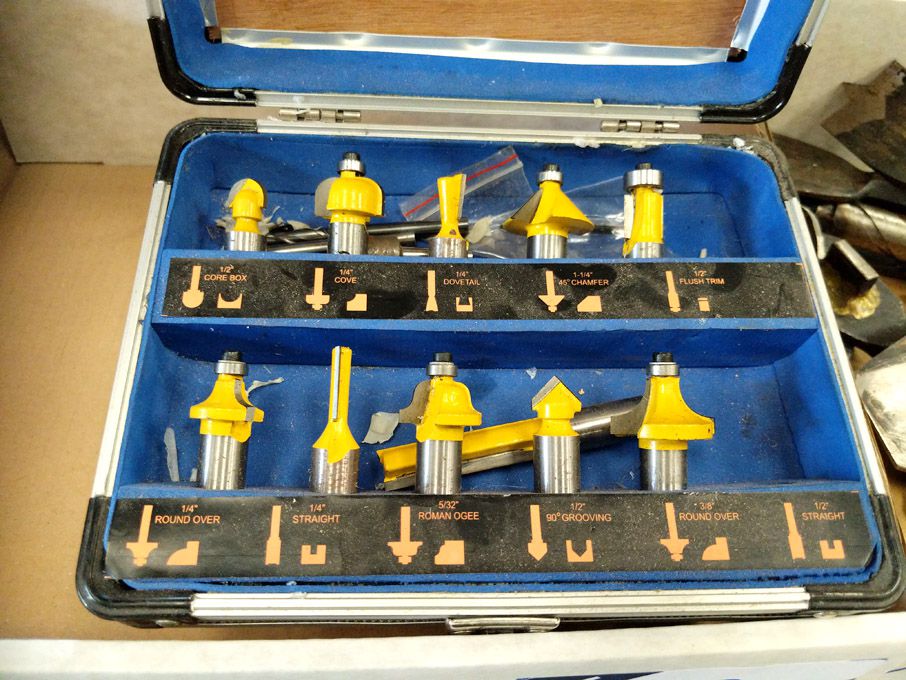 Qty various router bit sets in 2 cases