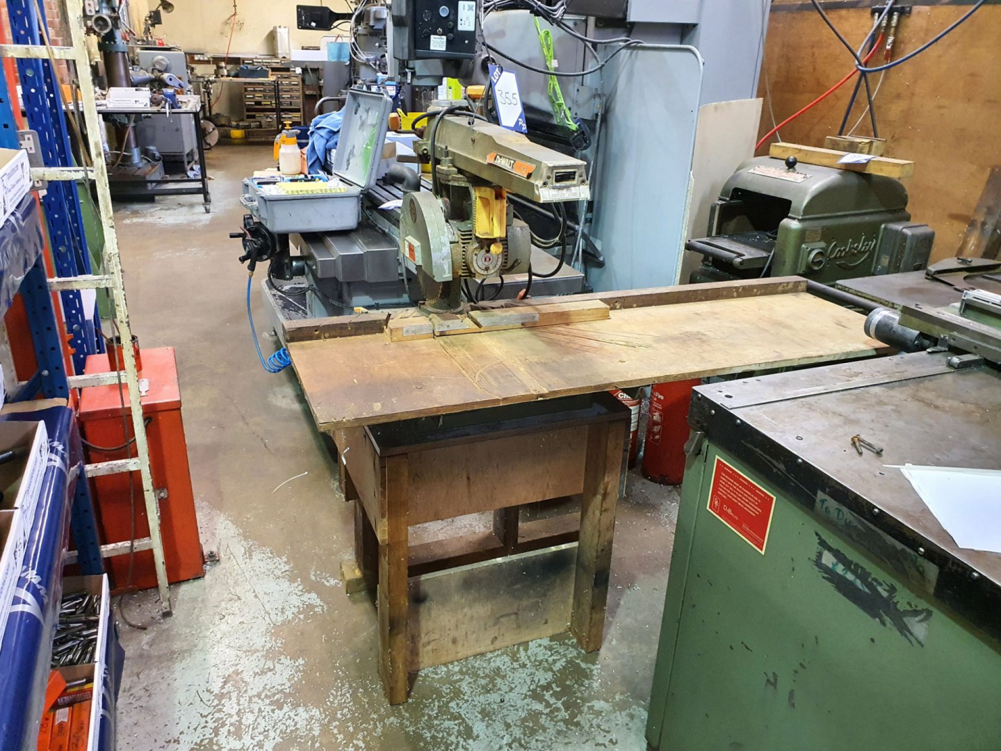 Dewalt DW110 cross cut saw on wooden stand, 240v