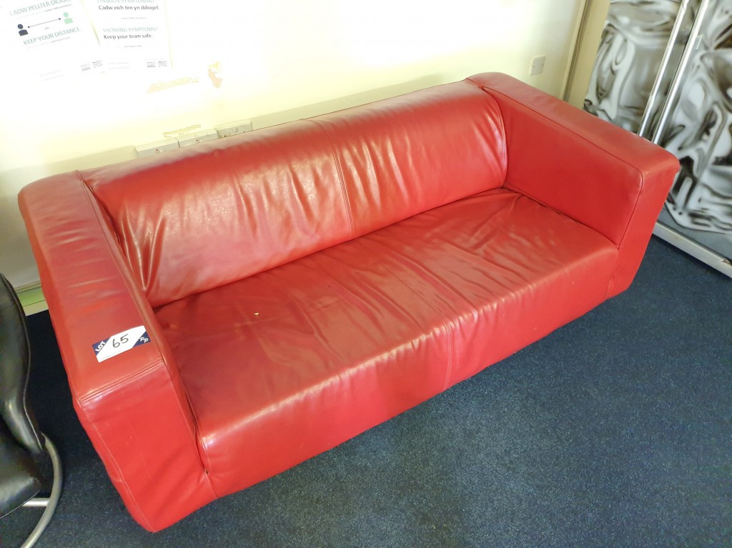 Red leather effect 2 seater sofa, 1800mm approx wi...
