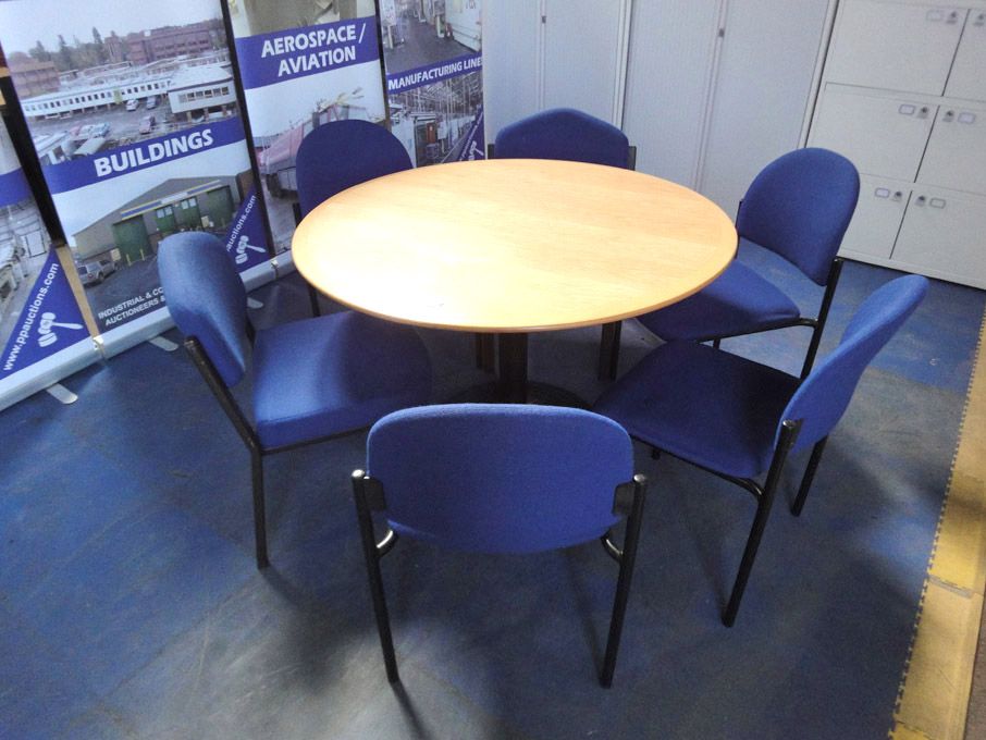 1200mm dia round table with 6x blue upholstered st...