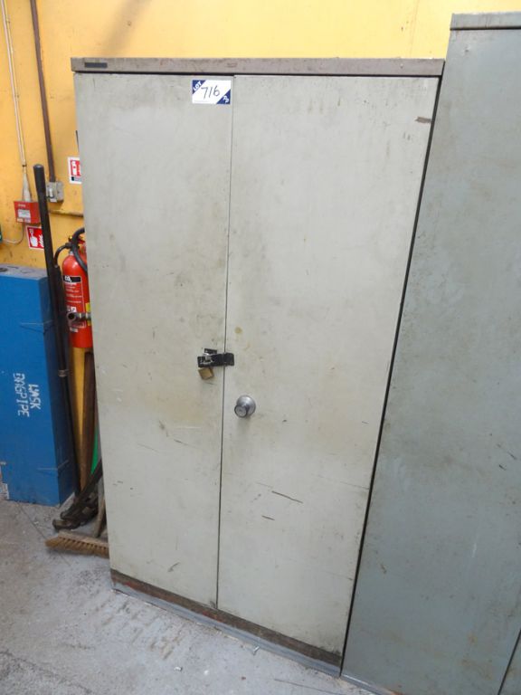 2 door storage cupboard with contents inc: sanding...