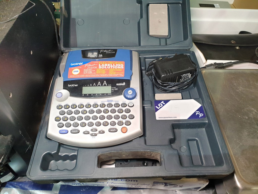 Brother 2450DX P-Touch label printer in carry case...