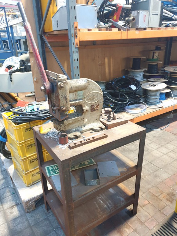 Rhodes manual press / punch on metal stand
