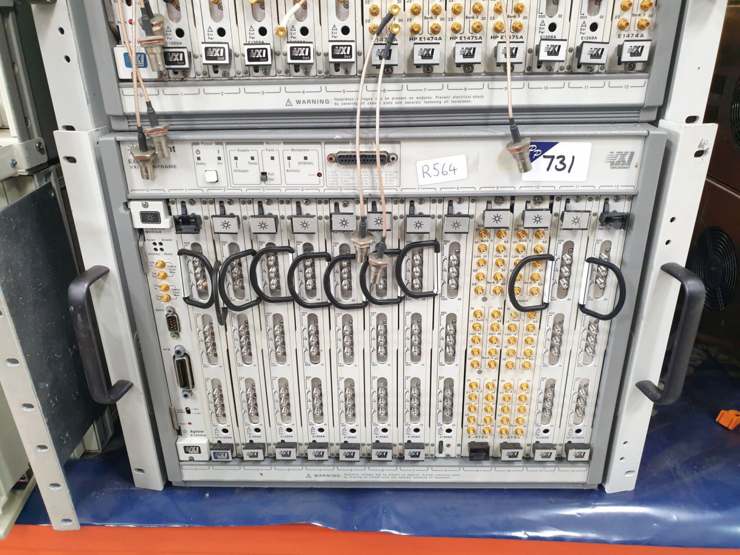 Agilent E8401A VXI mainframe with 1x E1406A, 10x E...