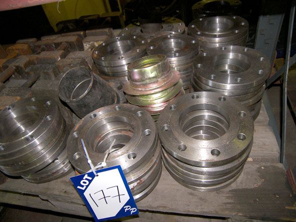 Qty various size metal flanges on pallet - Located...