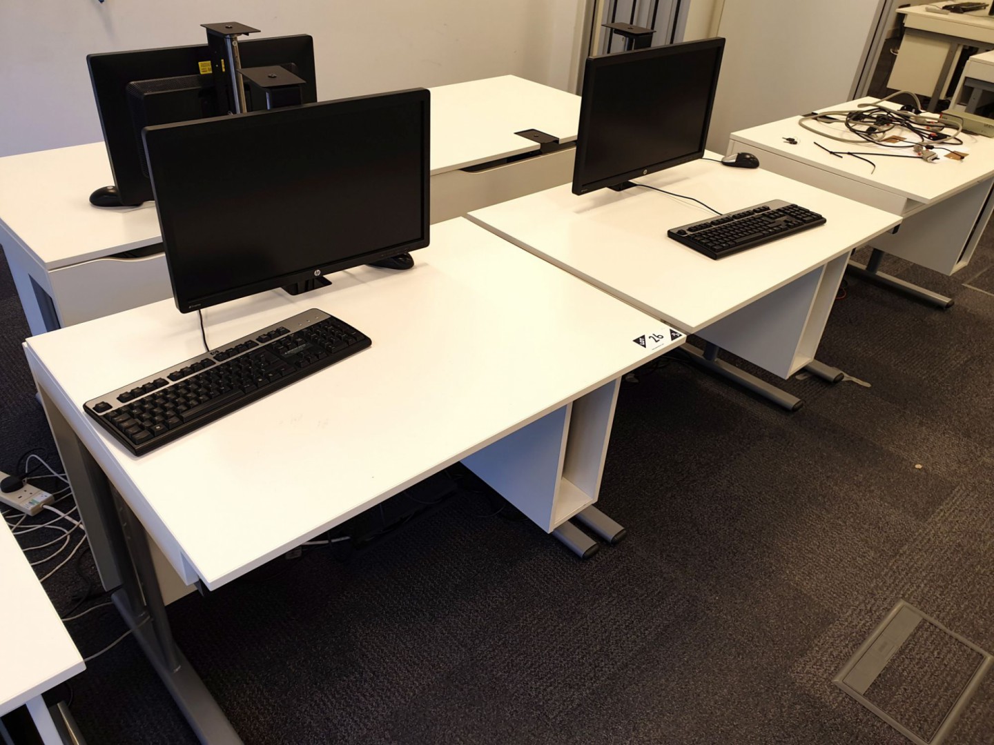 2x white 1000x700mm training desks with 2x Compaq...