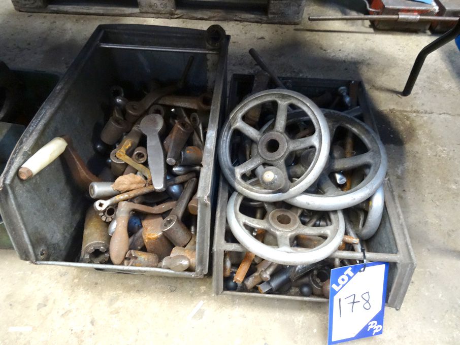 Qty various machine handles, wheels in 2 boxes