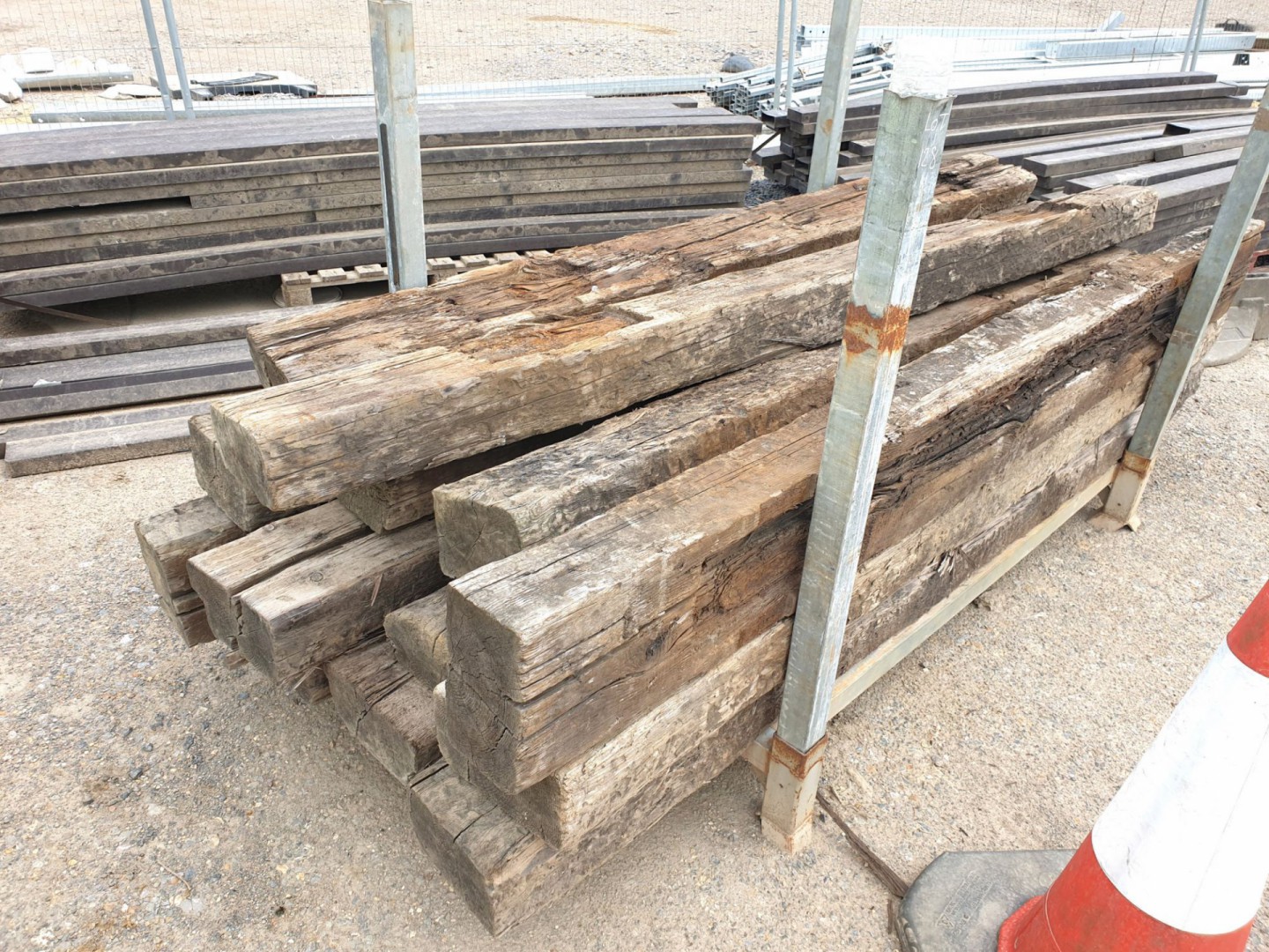 12x wooden sleepers in stillage, 2800mm approx lon...