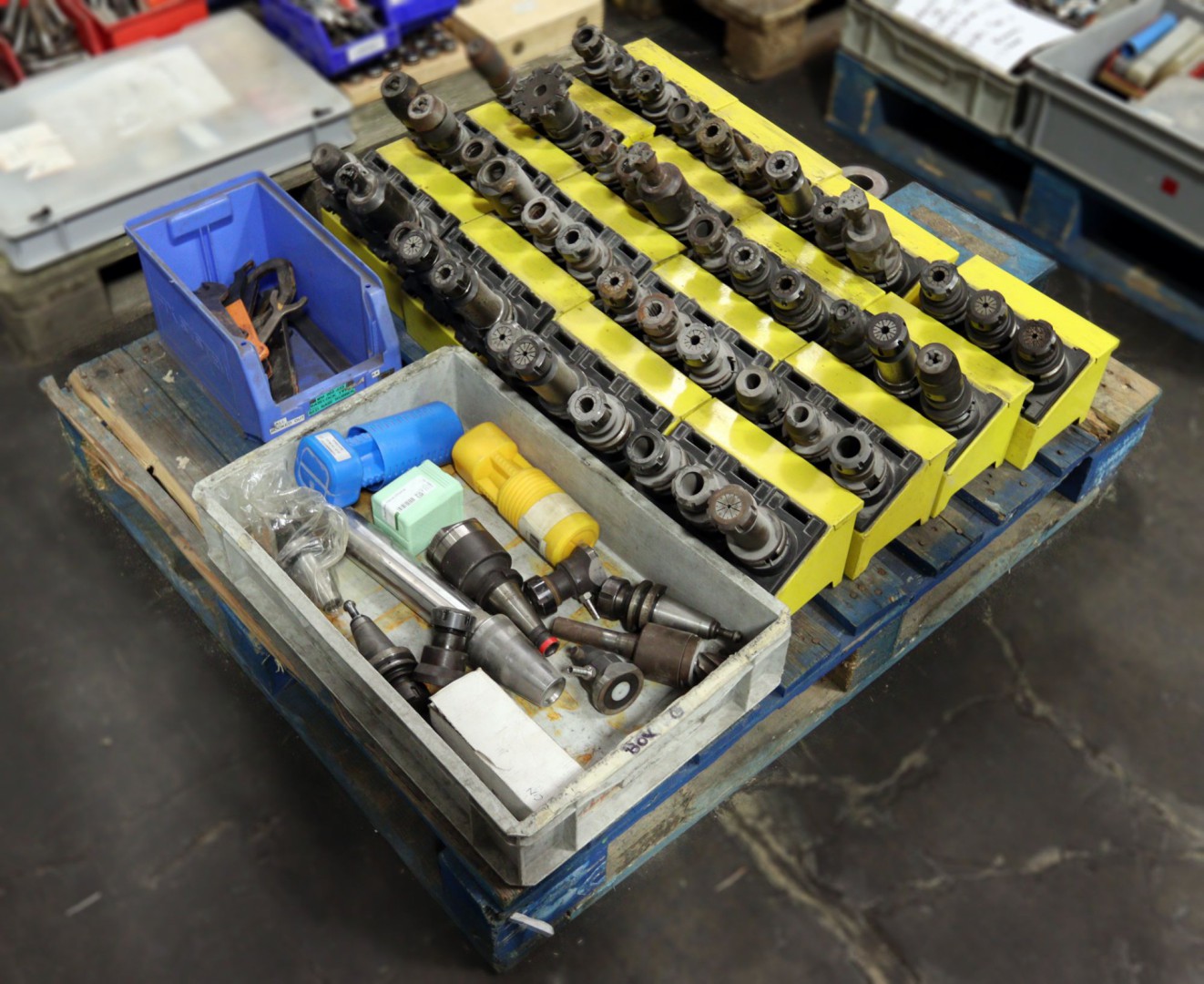 Qty ISO40 taper tool holders, spanners etc on pall...