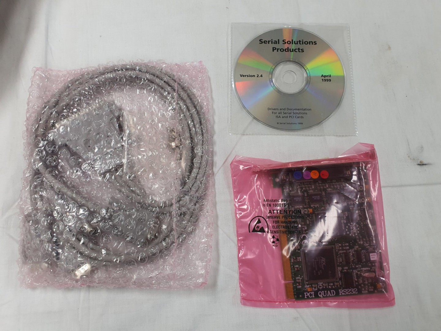 PCI Quad RS232 card, cable, CD (boxed)