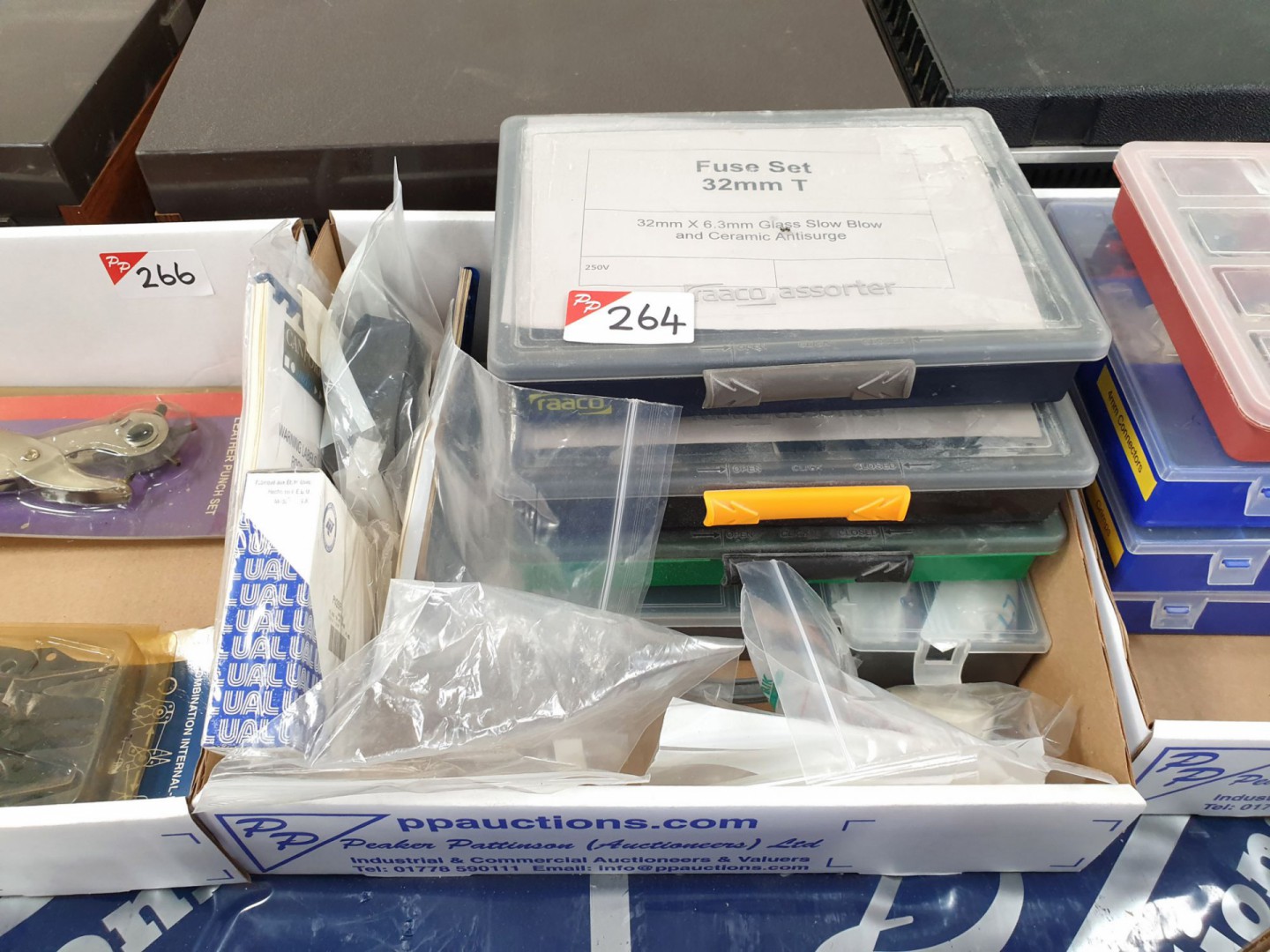 Qty various resistors, fuses, labels etc in 4 stor...