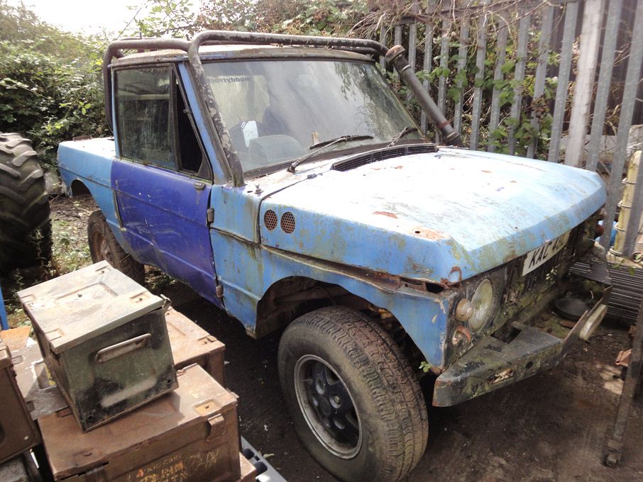 Blue Range Rover - modified for mud tracking (spar...